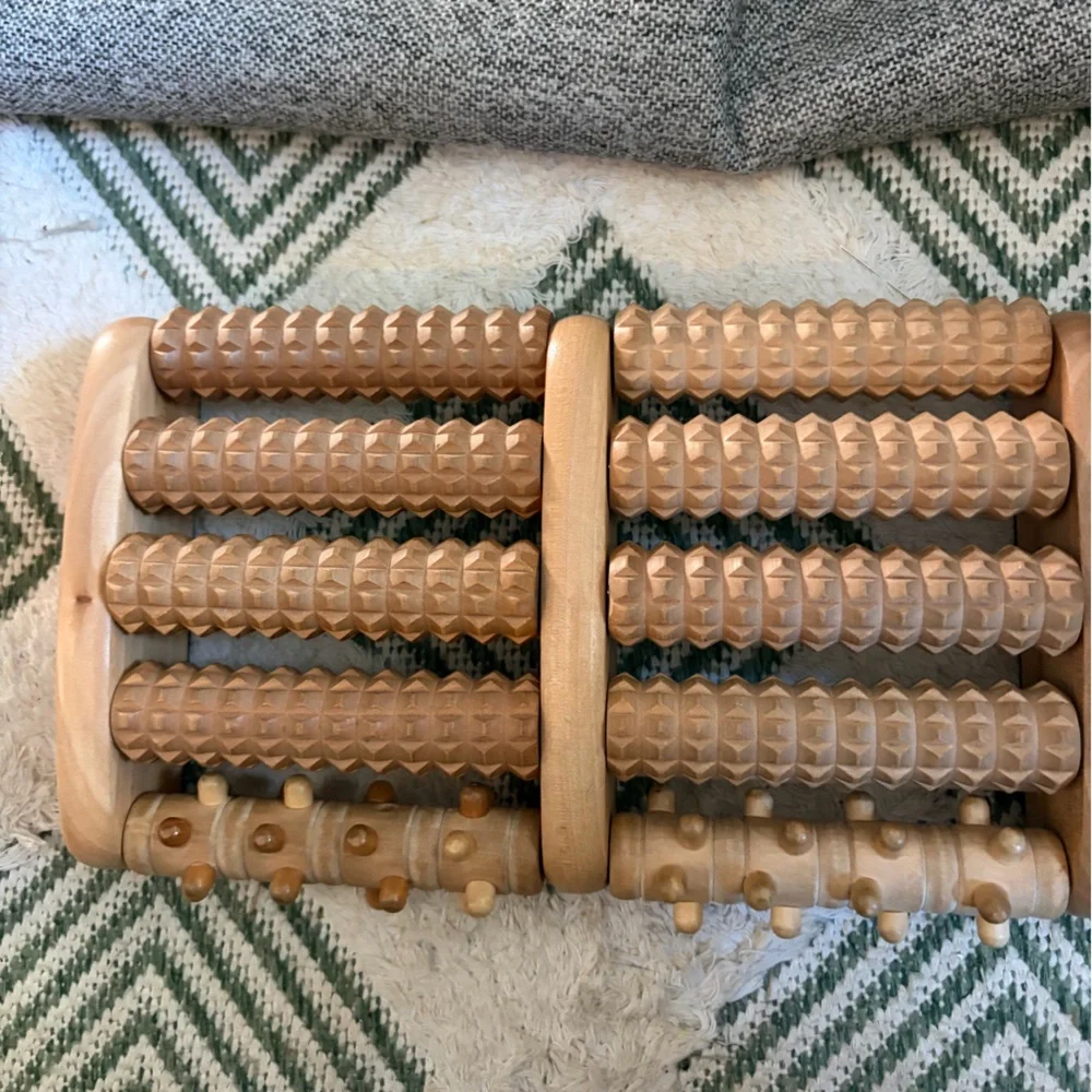 Source Unknown Wooden Foot Massager on Green and Cream Bath Mat